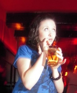 Rachel in Amsterdam drinking in Amsterdam