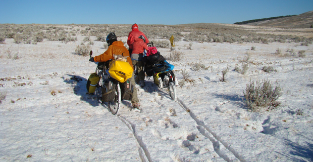 family on bikes in the snow